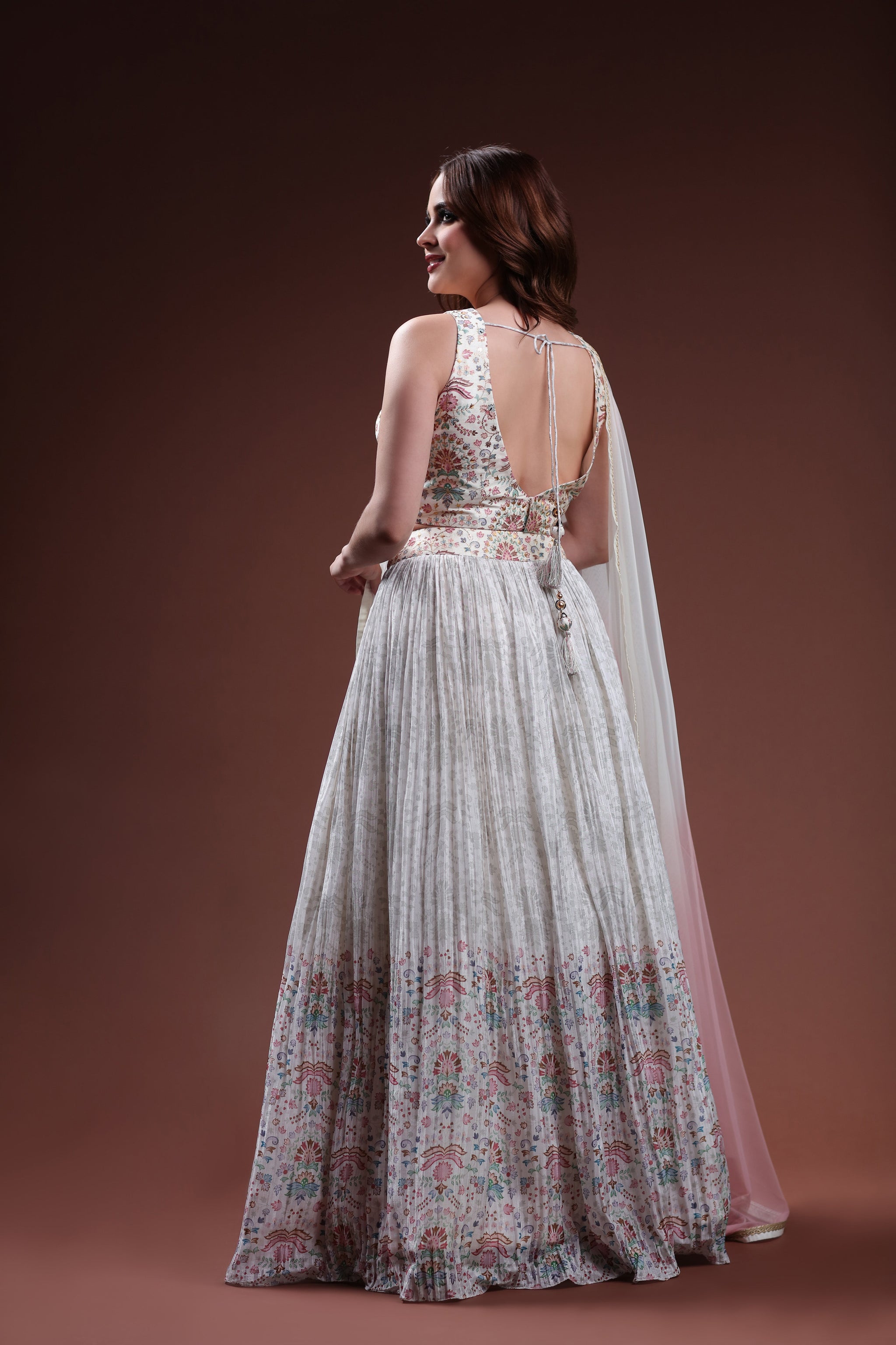 Winsome Ivory Ensemble featuring A Floral Lehenga and CROP top