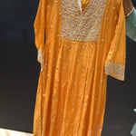Beautiful Yellow Pant suit for women.