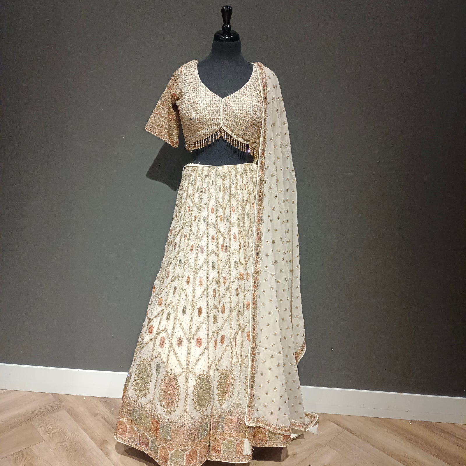 Opulent Ivory Lehenga with Multicolor Threadwork