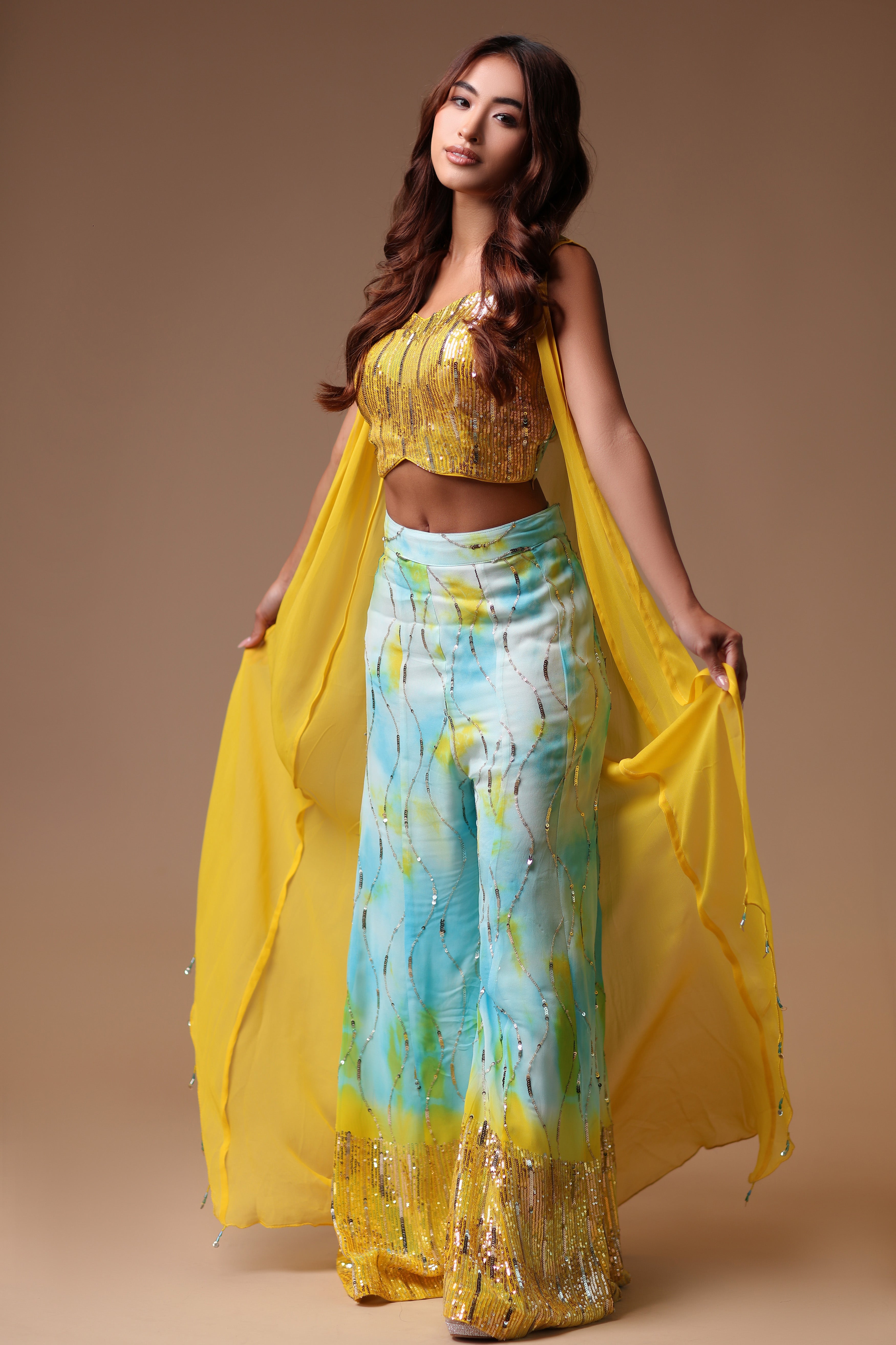 Glitzy Dholki Outfit  Featuring Palazzo Pants and Halter Strap Blouse