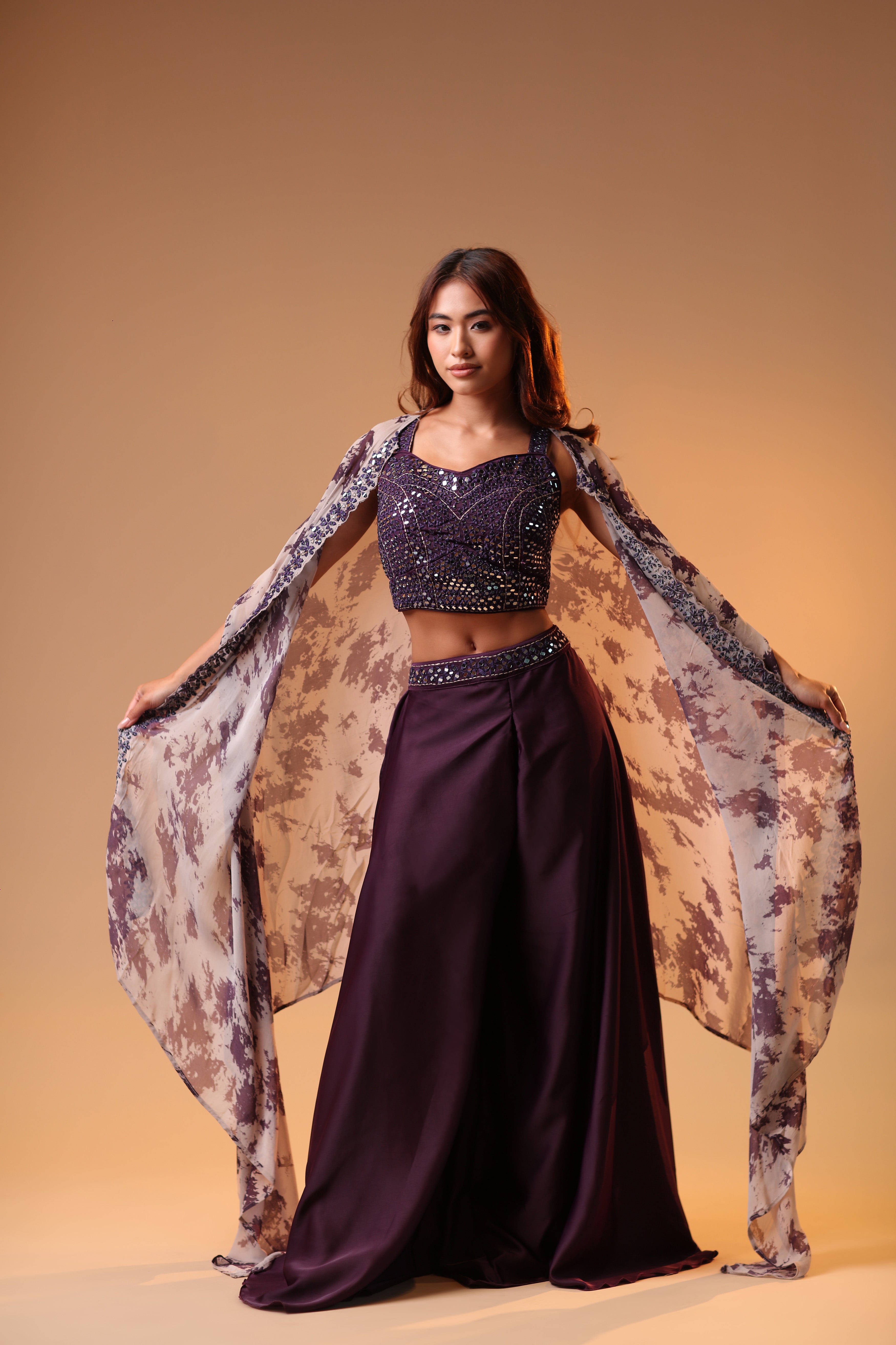 Classic Purple Attire Featuring A Sequined Blouse And Lehenga
