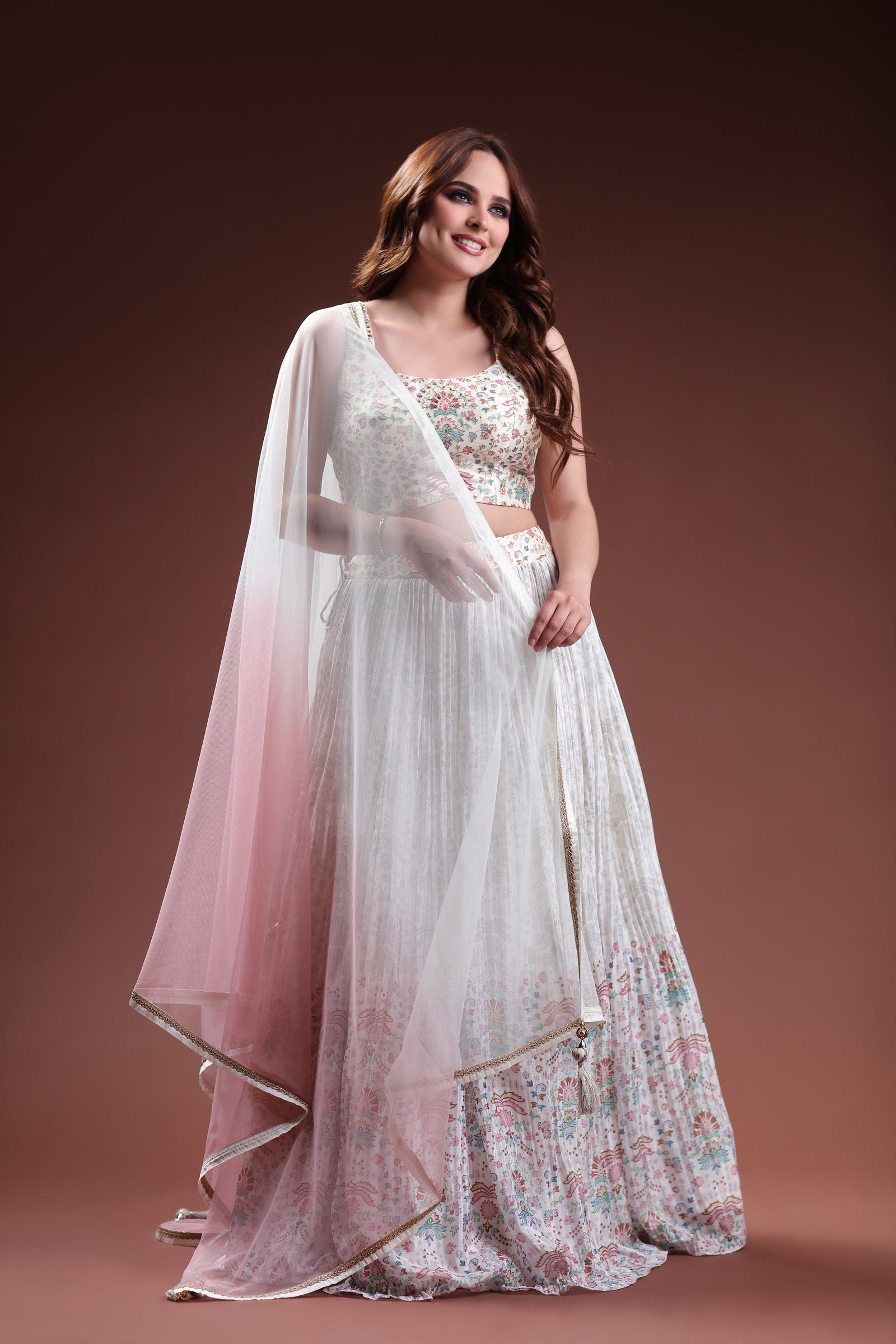 Winsome Ivory Ensemble featuring A Floral Lehenga and CROP top