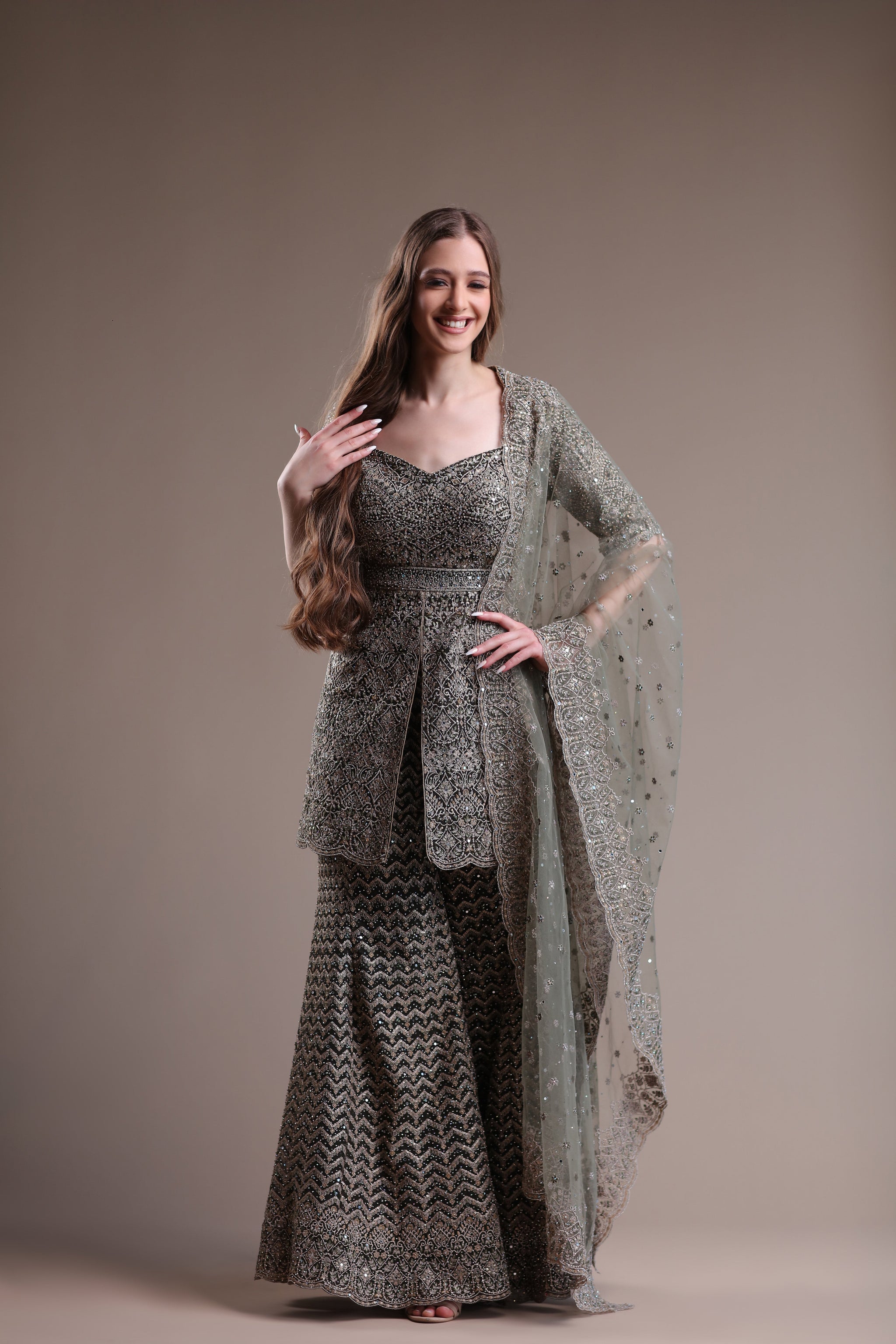 Luxurious Grey Ensemble Featuring An Embellished Sharara And Kameez