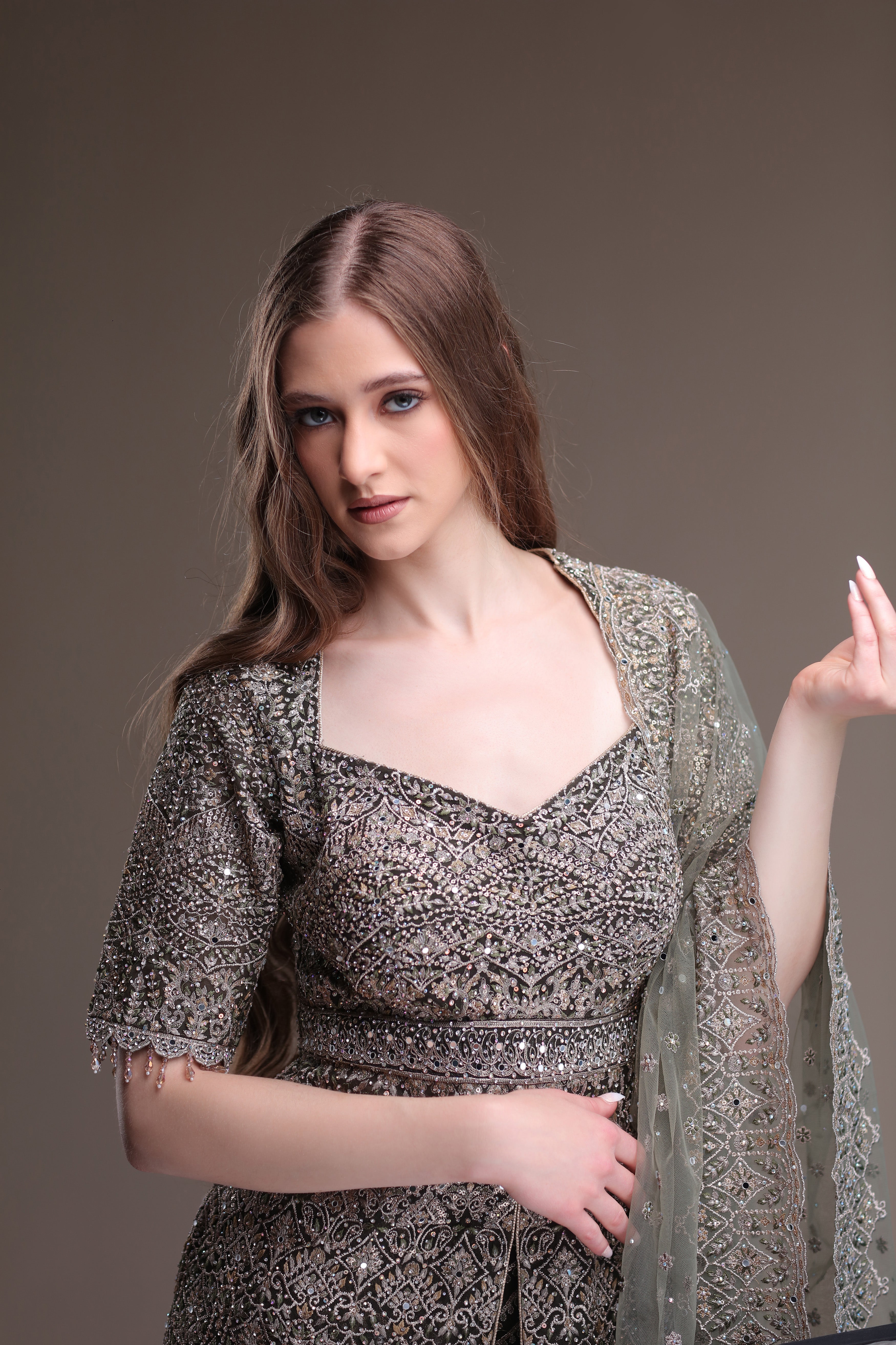 Luxurious Grey Ensemble Featuring An Embellished Sharara And Kameez