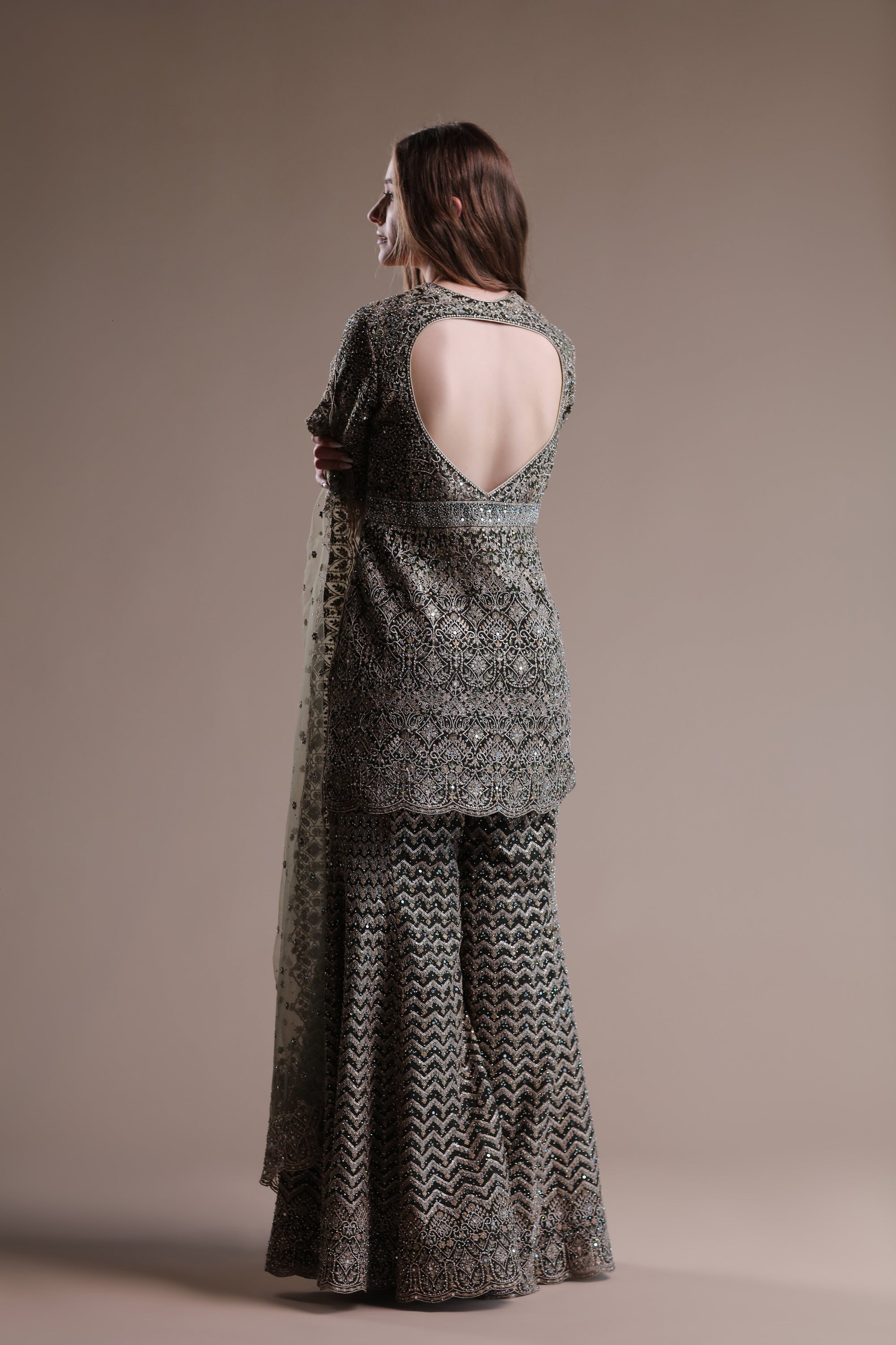 Luxurious Grey Ensemble Featuring An Embellished Sharara And Kameez