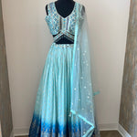 Ombre lehenga with belt attached to embellished choli