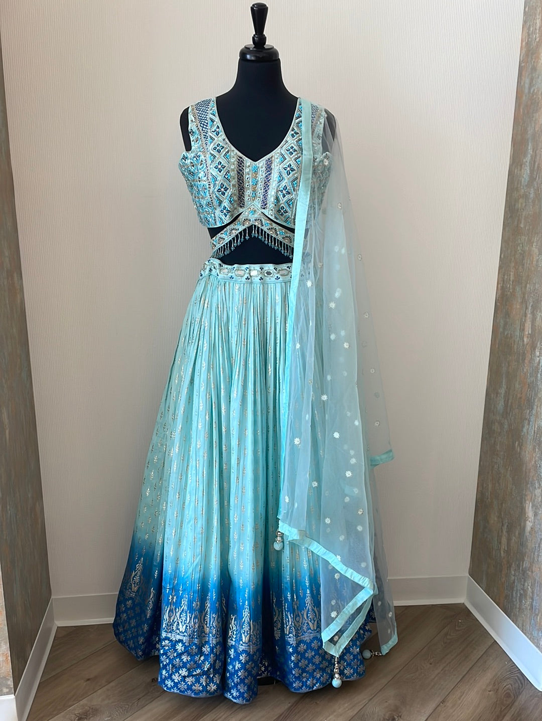 Ombre lehenga with belt attached to embellished choli