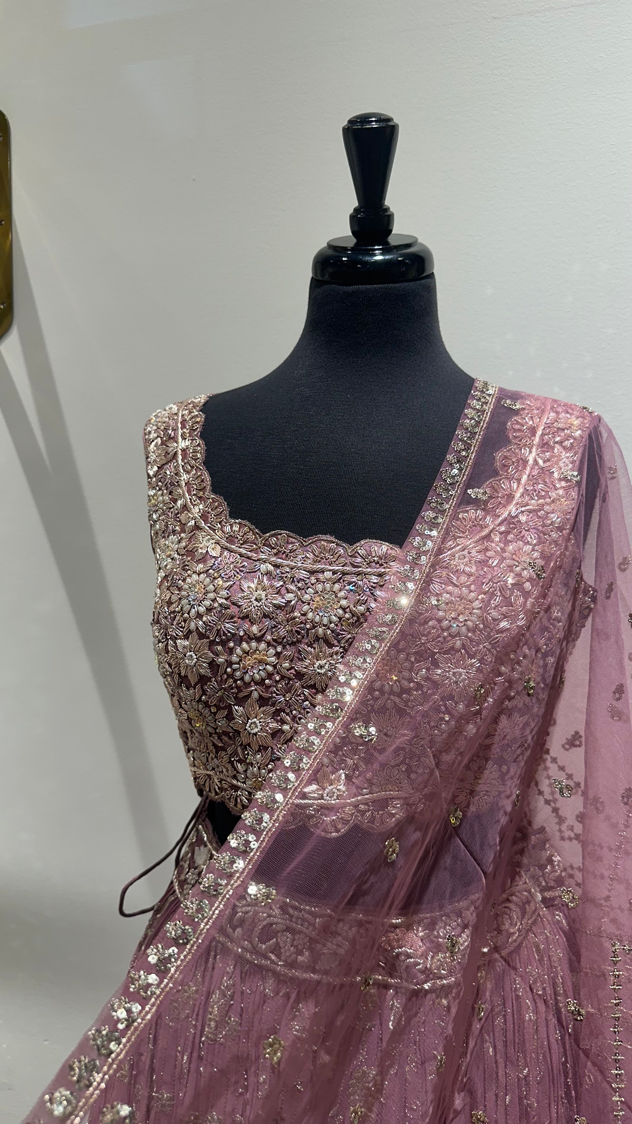 Dazzling Blouse With Detailed Lehenga