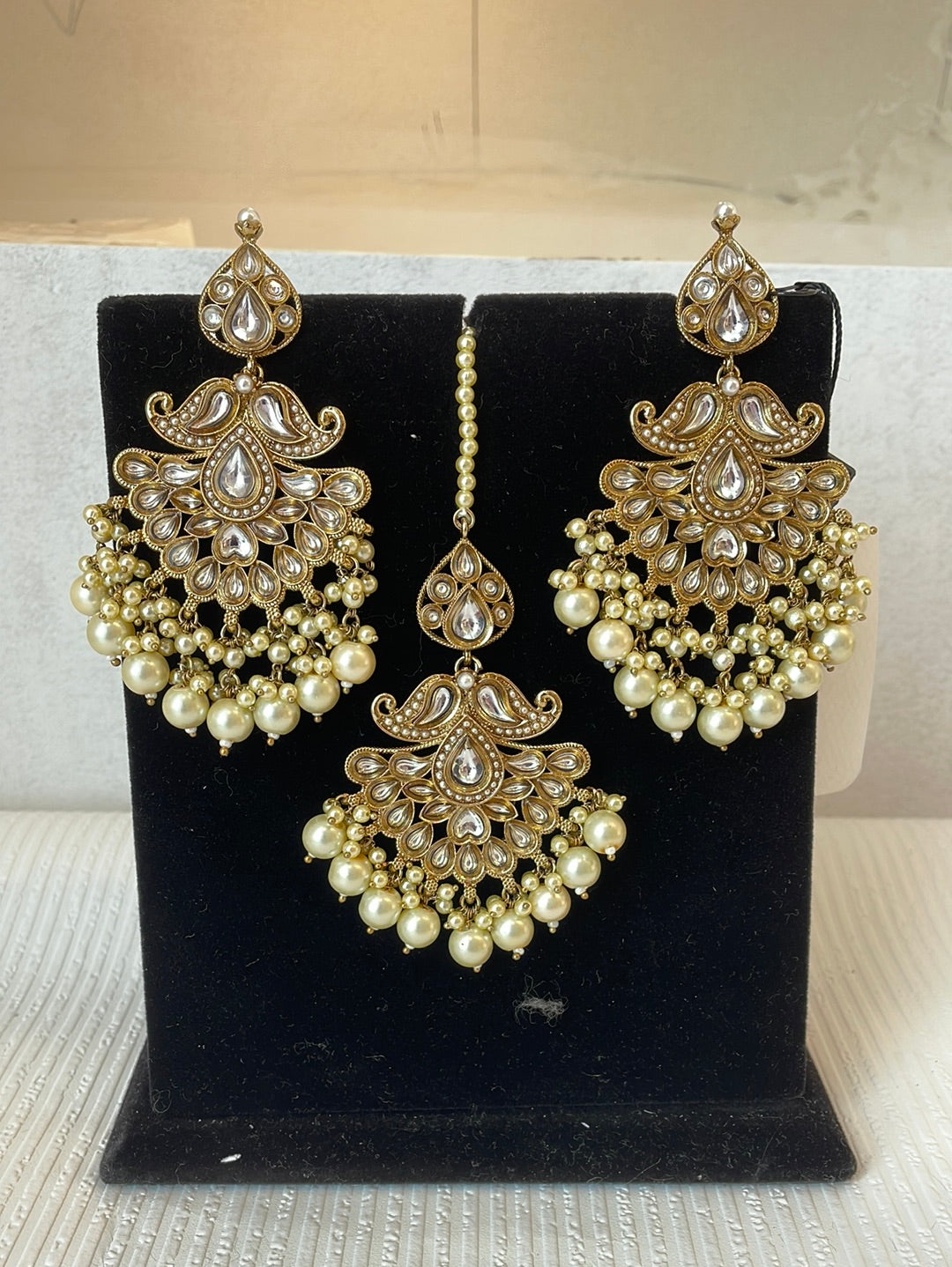 Golden Pearl And Faux Kundan Tikka Set