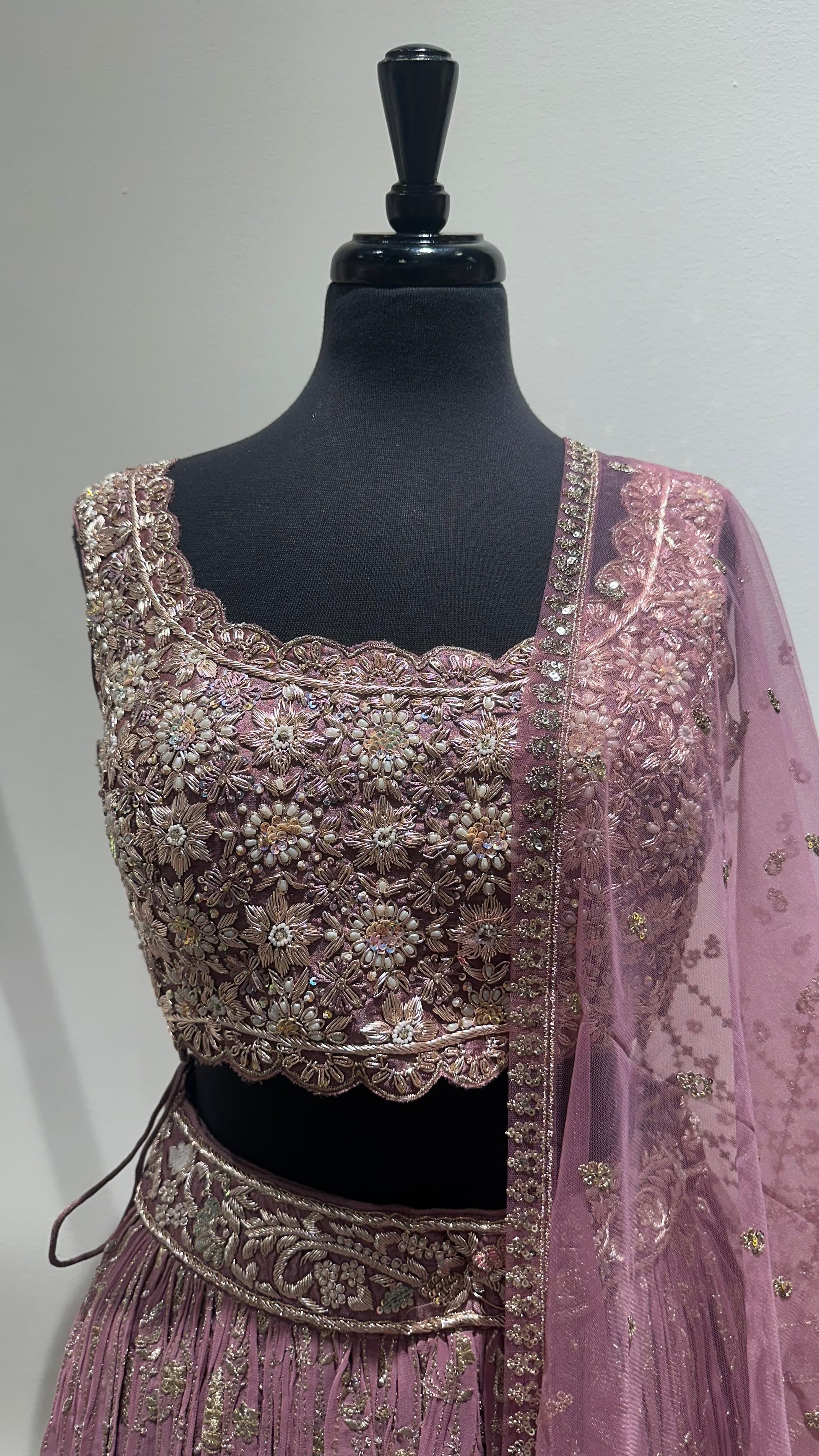 Dazzling Blouse With Detailed Lehenga