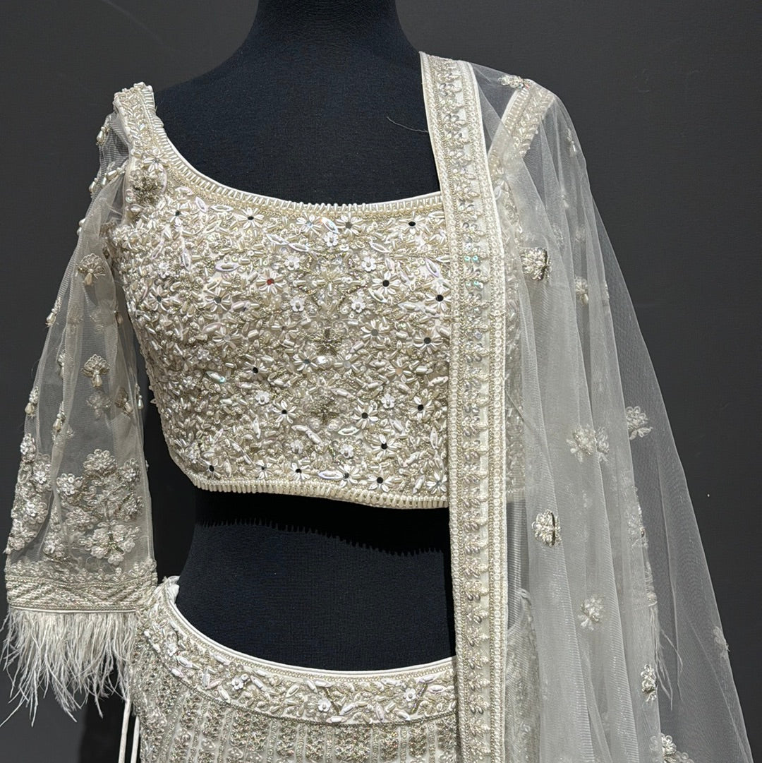 Pearl-Adorned White Lehenga Elegance