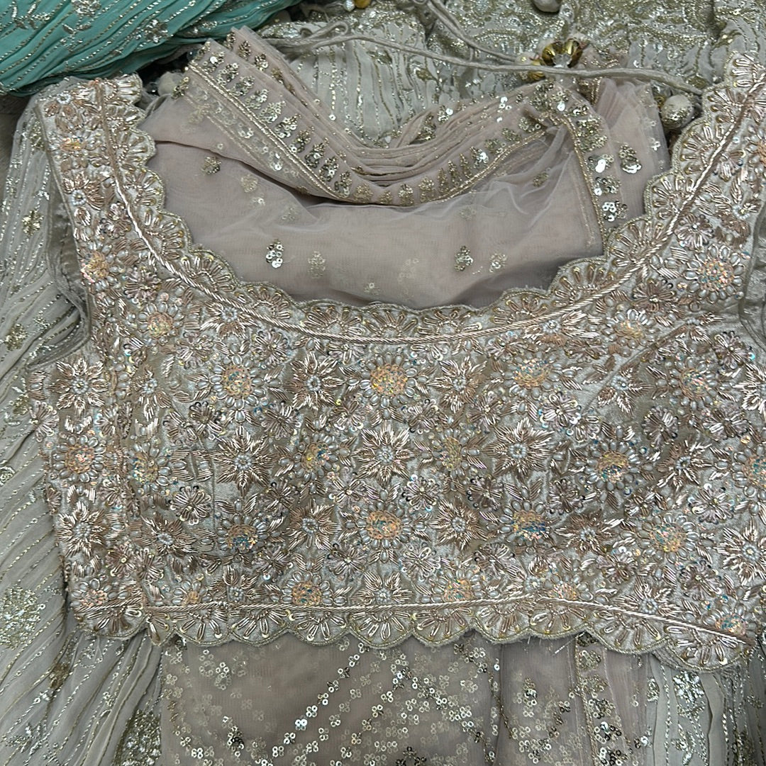 Dazzling Blouse With Detailed Lehenga