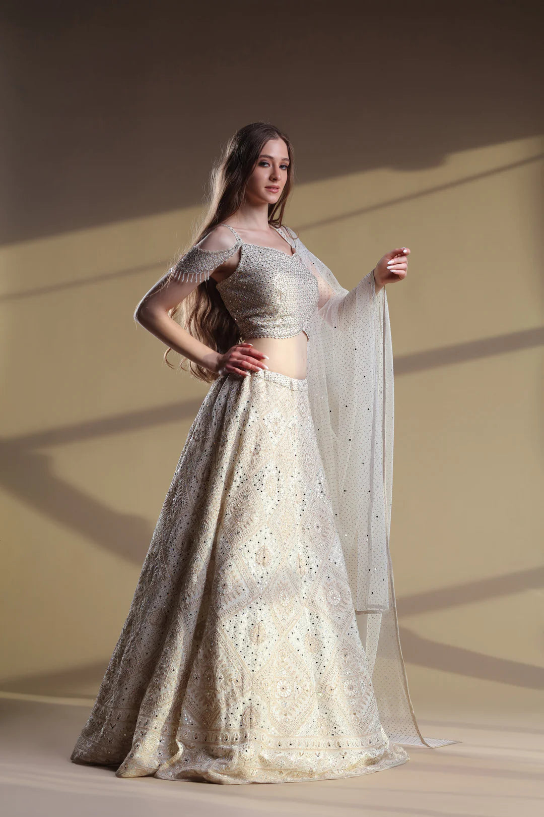 Model is wearing Best Snowy Lehenga And Silver Blouse.