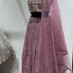 Dazzling Blouse With Detailed Lehenga