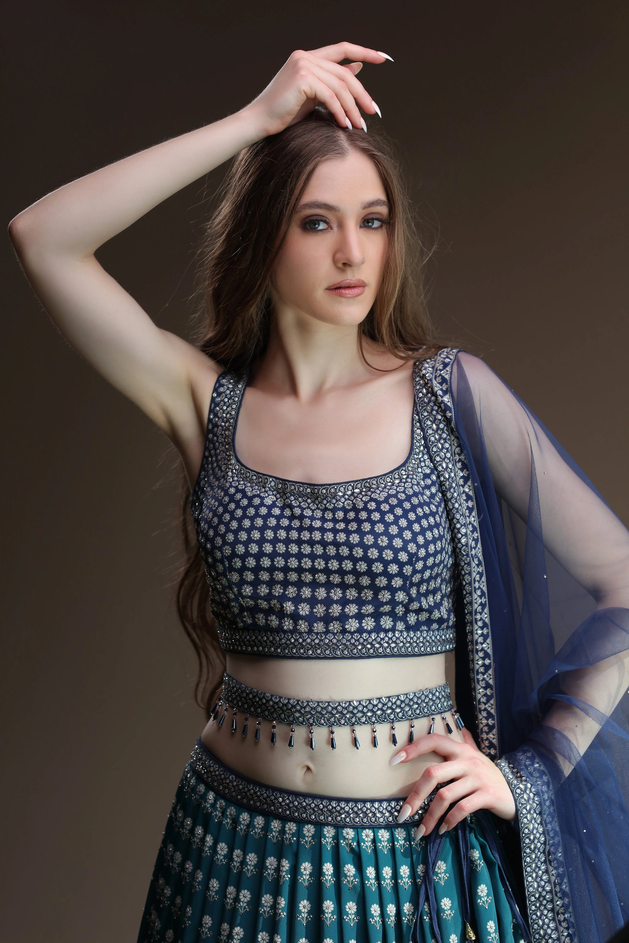 Model is wearing Navy Blue Lehenga