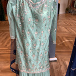 beautiful sage green sharara suit for events.