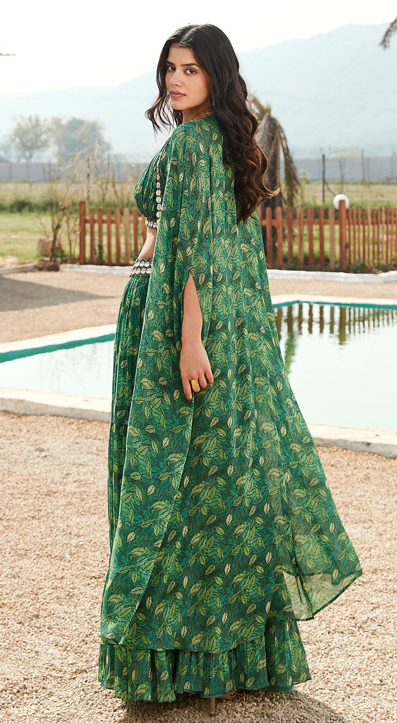 model is showcasing stylish green skirt set with a floral print.