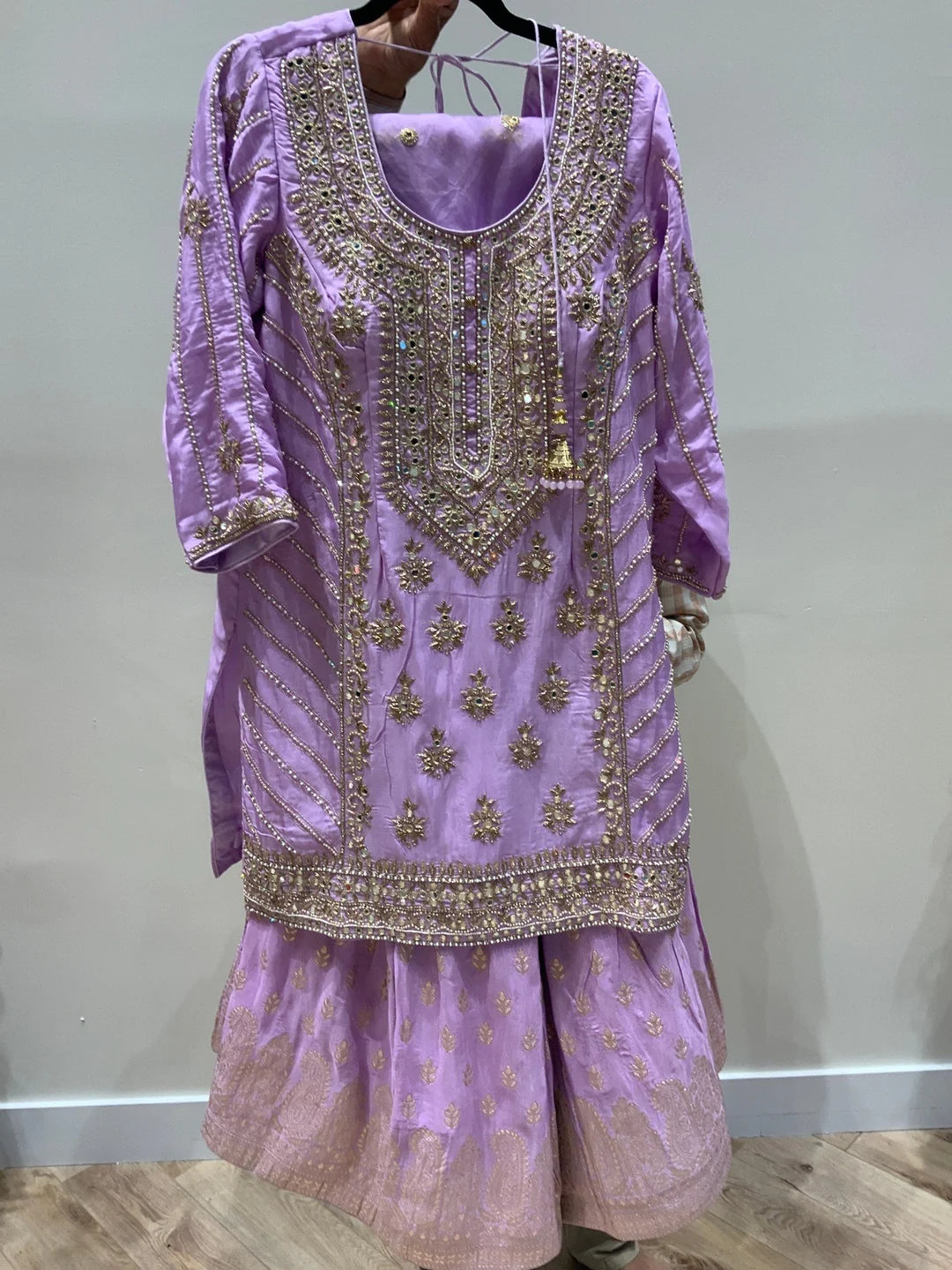 Lavender gharara suit for women.