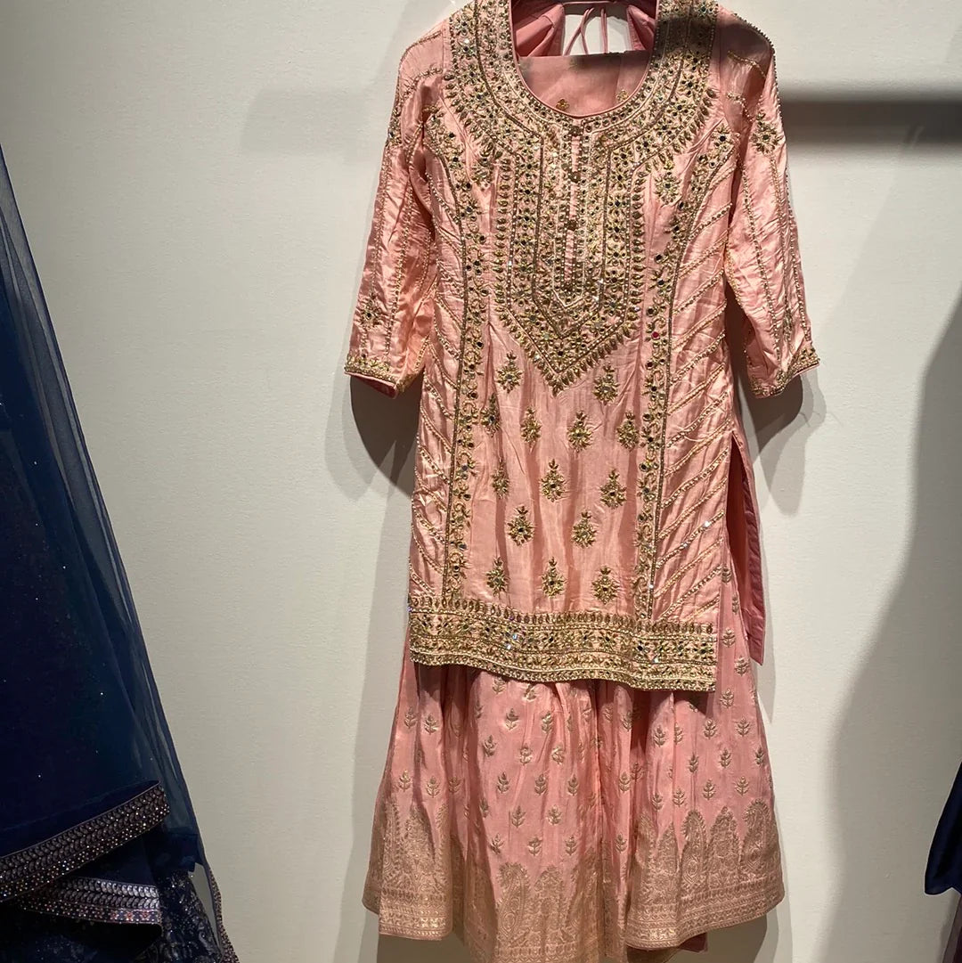 peach gharara suit for women.