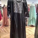 Black cotton kameez shalwar for women.