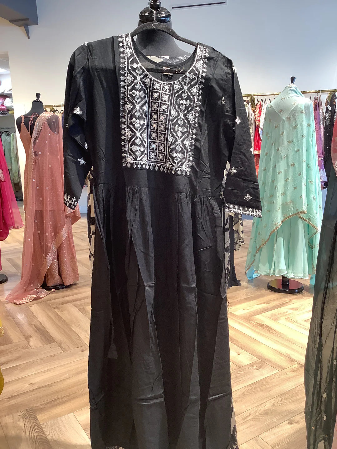 Black cotton kameez shalwar for women.