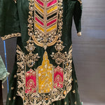 heavily embroidered green gharara outfit.