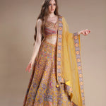 The ensemble worn by the model features a fashionable floral-patterned lehenga.