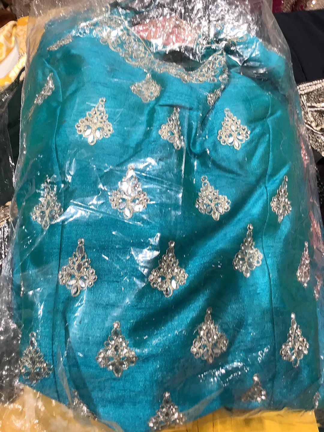 turquoise sharara suit for women.