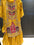 heavily embroidered yellow gharara outfit.